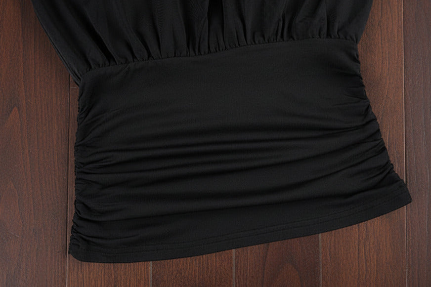 Women’s long‑sleeve top with fitted waist
