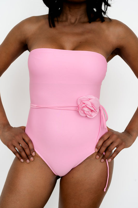 Women’s solid‑color one‑piece swimsuit with 3D floral accents