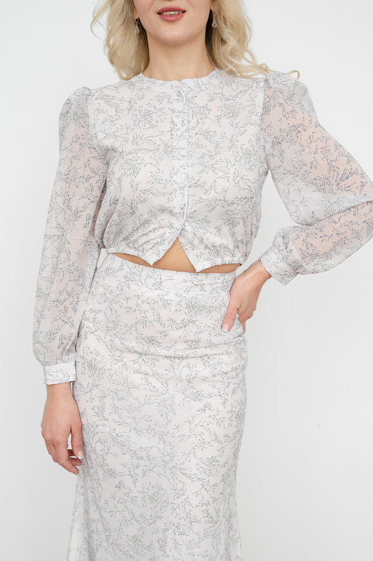Printed long‑sleeve blouse with matching high‑rise maxi skirt