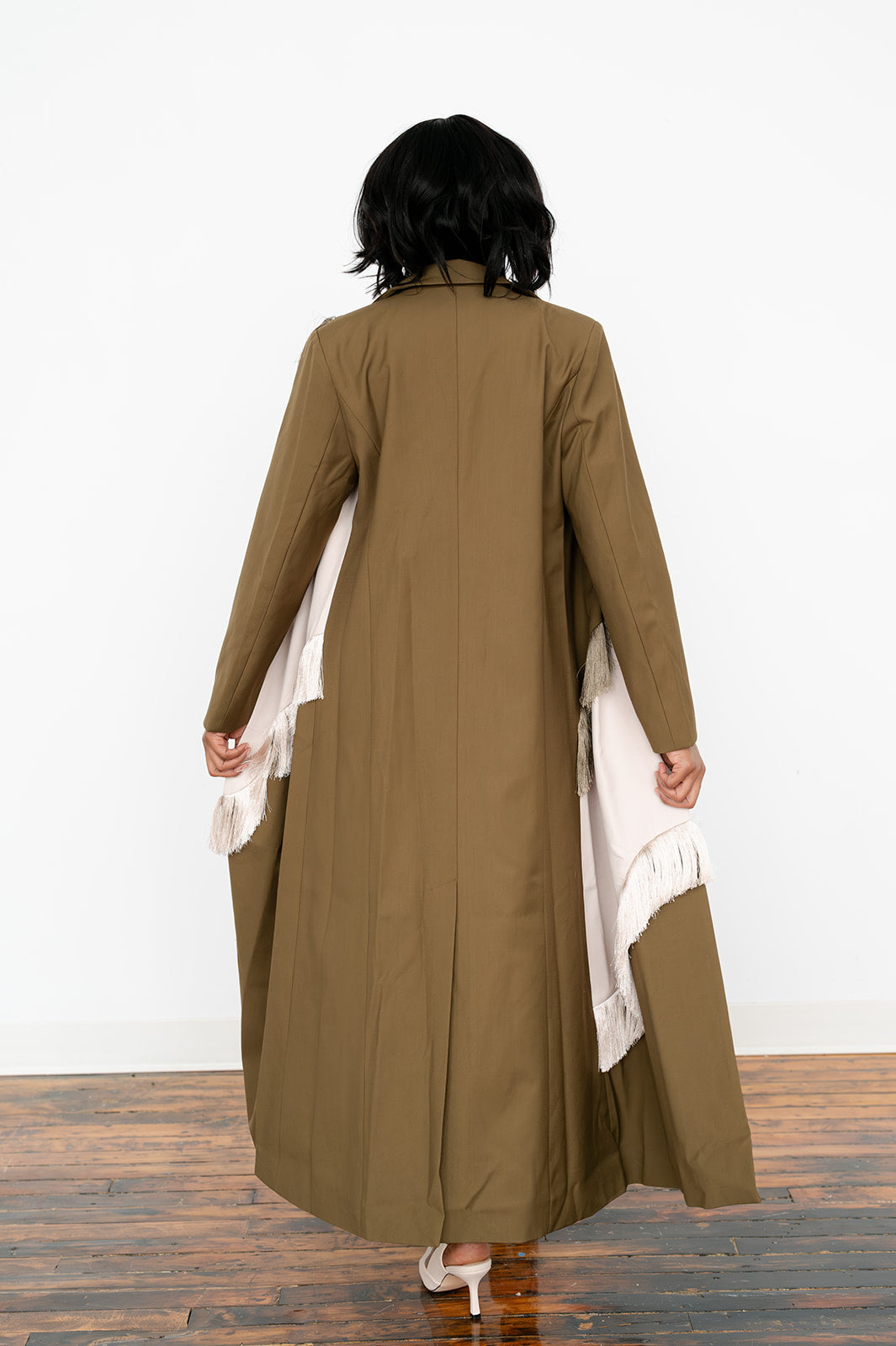 Early autumn extra‑long statement coat