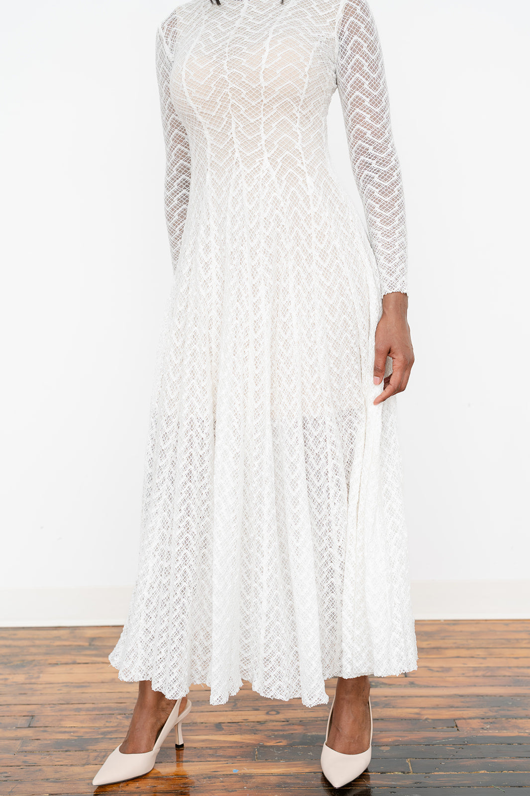 Stand‑collar lace slim maxi dress with tan undergarment