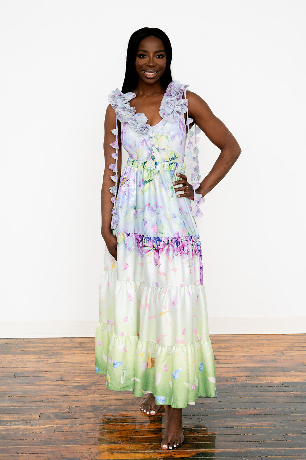 One‑piece swimsuit with floral motif and decorative bloom