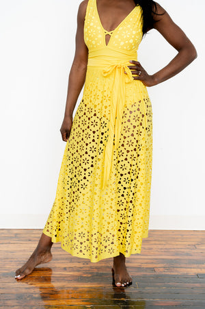 Backless ruched one‑piece swimsuit with coordinating skirt set
