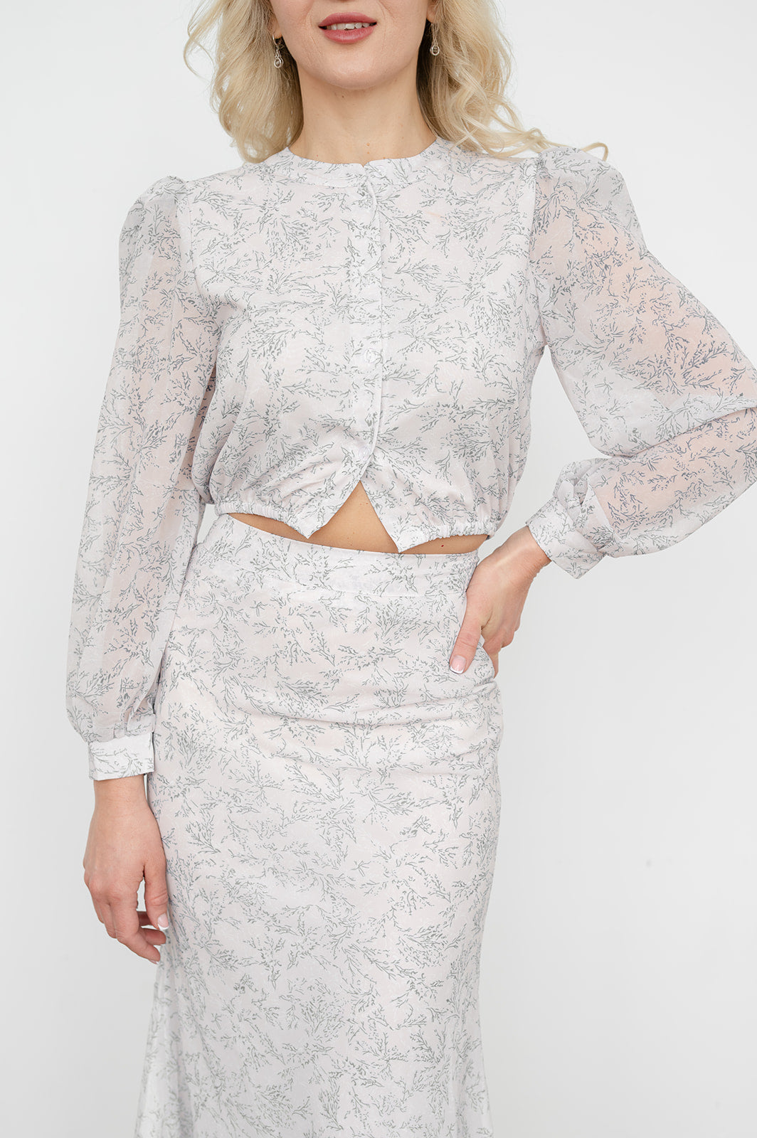 Printed long‑sleeve blouse with matching high‑rise maxi skirt