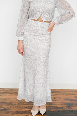 Printed high‑waist maxi skirt and matching long‑sleeve blouse