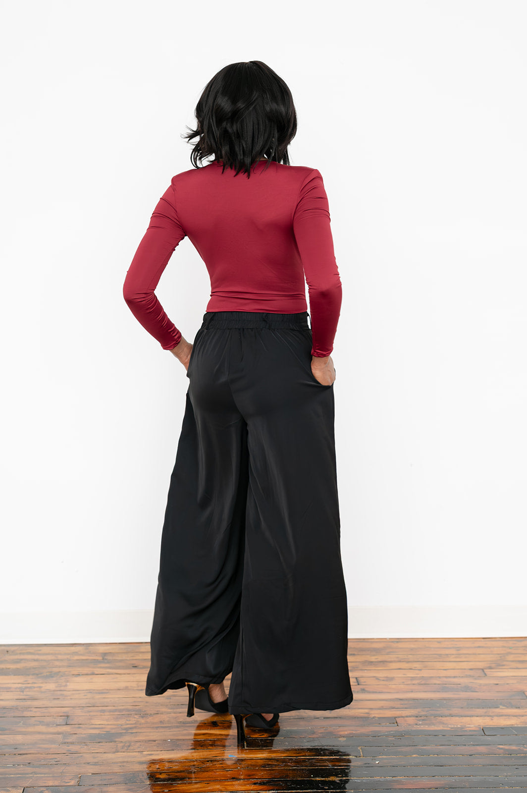 Elara Deep‑V Long‑Sleeve Ruched Bodysuit