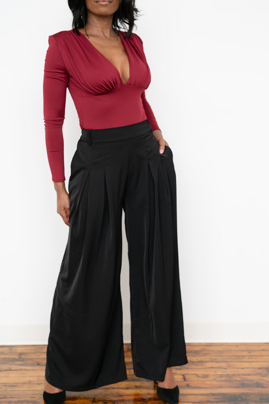 Elegant long‑sleeve V‑neck bodysuit for spring and fall