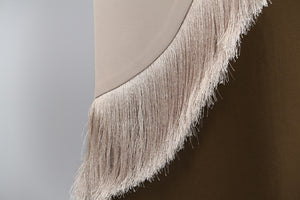 Asymmetric fringe‑trimmed outerwear for women