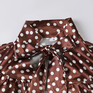 Loose‑fit tie‑neck blouse