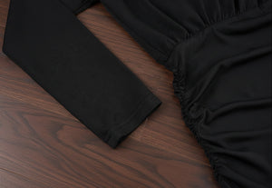 Women’s long‑sleeve top with fitted waist